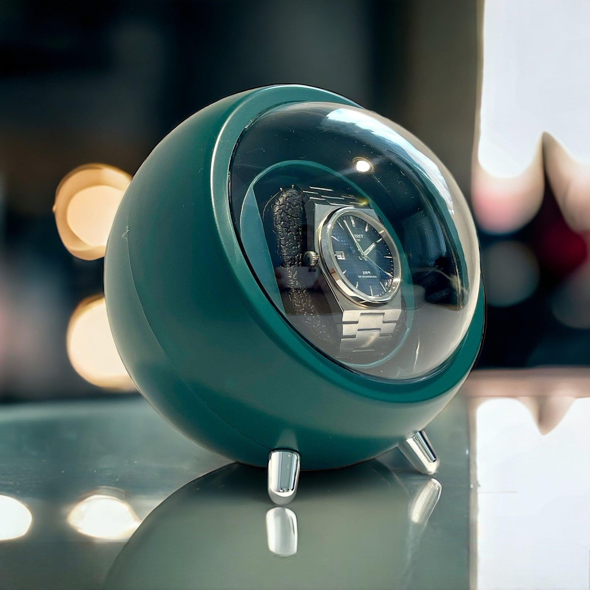 Cyclops Watch Winder, Green Colour, Front Side, On Luxury Table